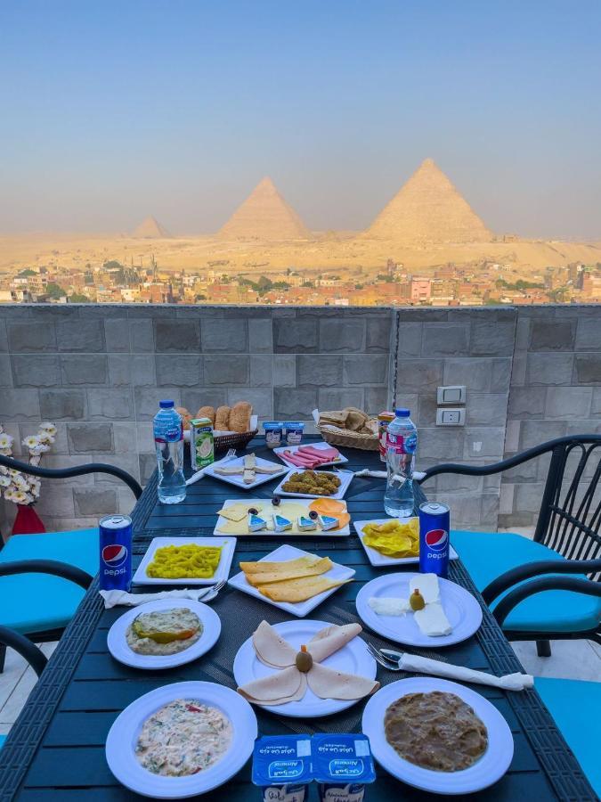 Jumeirah Pyramids View Inn Kafret el-Gabal Exterior foto